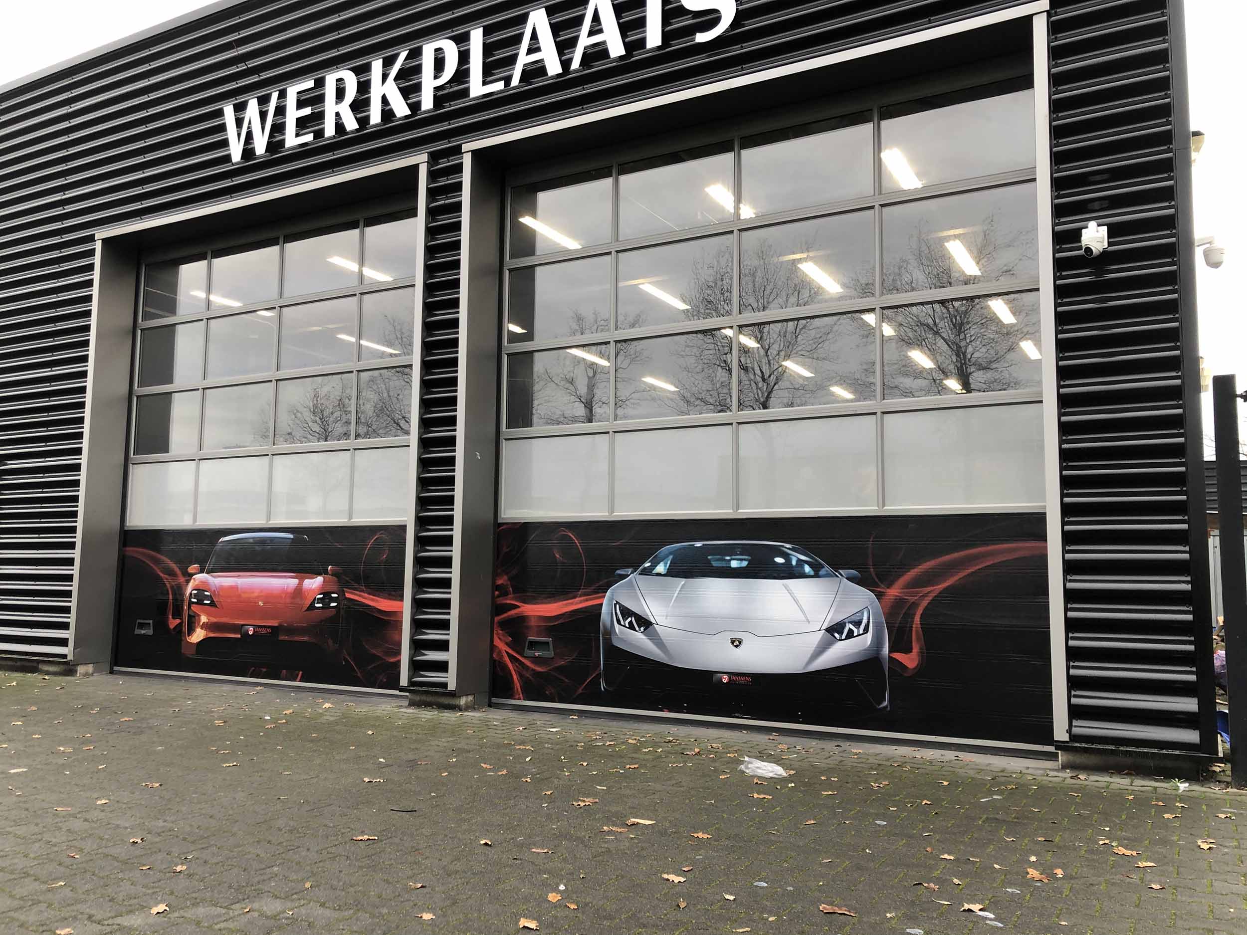 Garagedeur belettering Janssens Autoservice Venlo